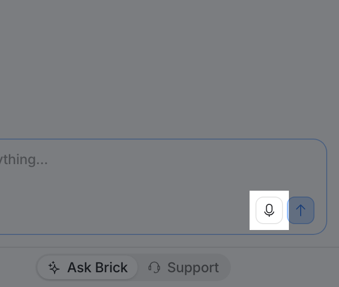 The microphone button at the right of the message box